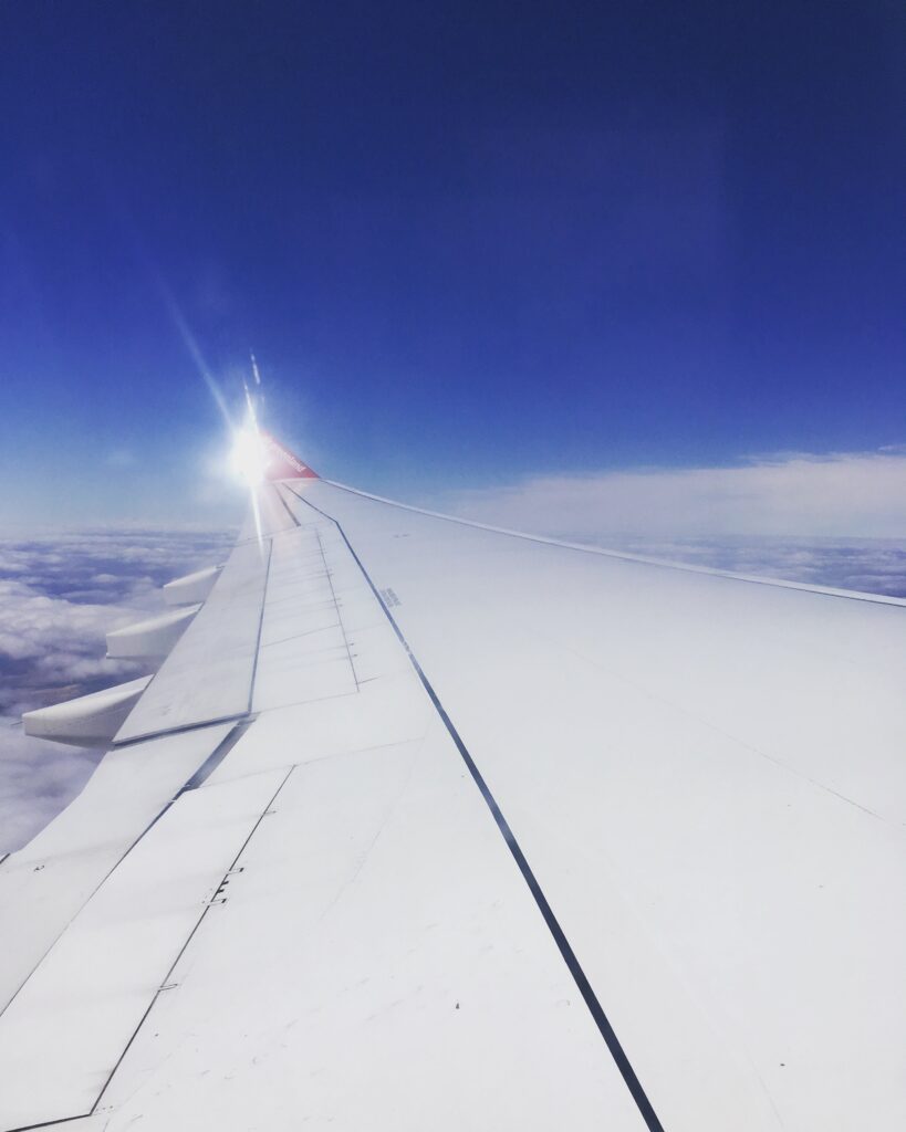 Flying over fluffy clouds in Denmark