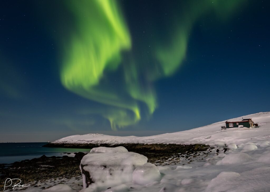 Northern lights over the beach