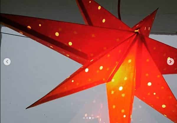 Red christmas star in window