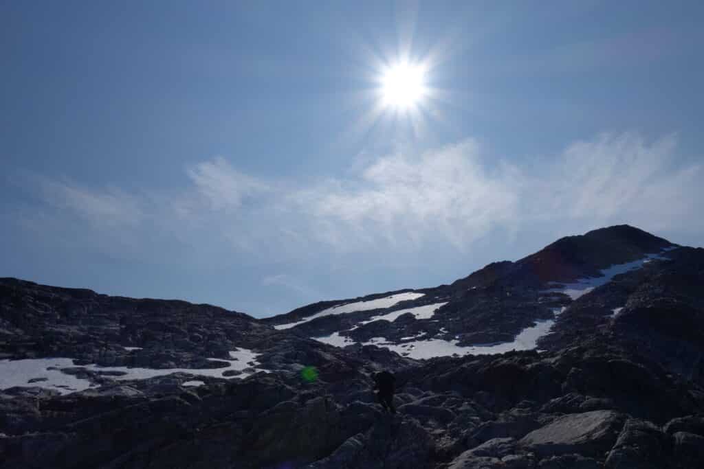 Sun shining and snowy mountain