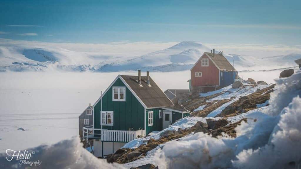 Colorful houses with amazing view to a landscape covered in snow