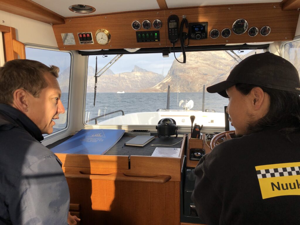 Passenger and captain talking