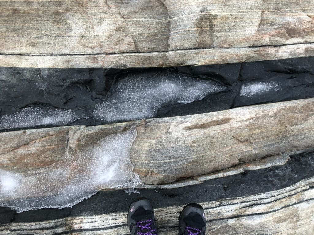 Sedimentary lines visible in snow