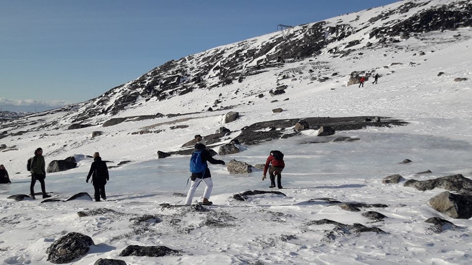 People on a natural ice rink