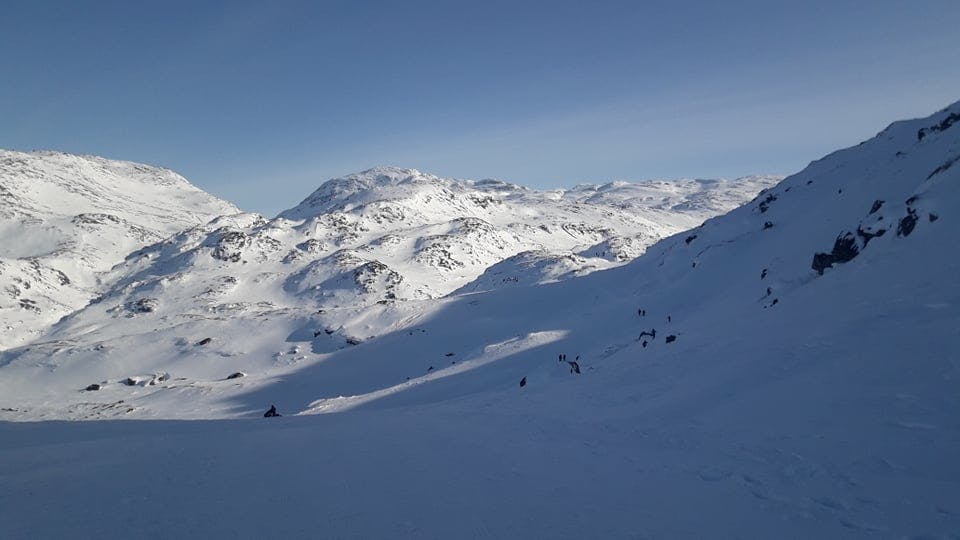 In the shade of the mountain
