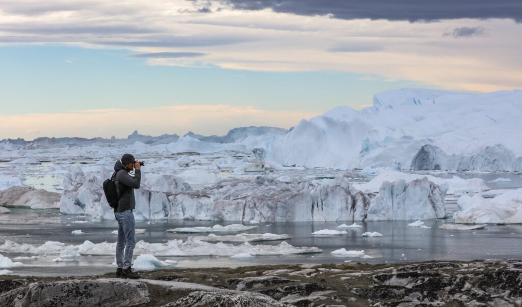Per Bossen taking pictures of the icefjord