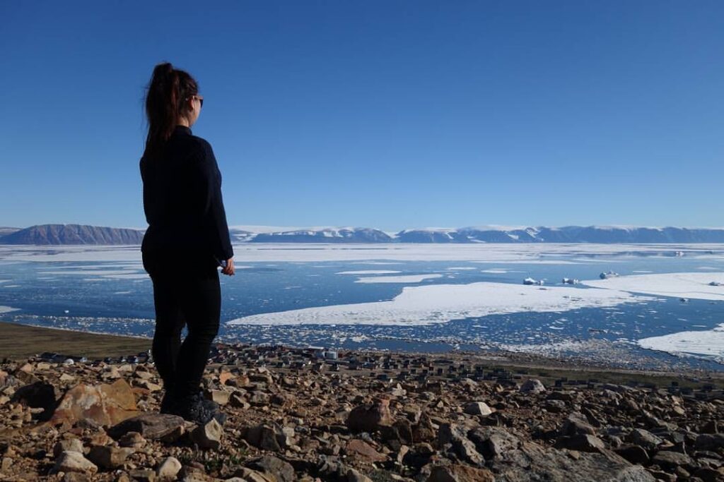 Woman enjoying the view of the icefjord