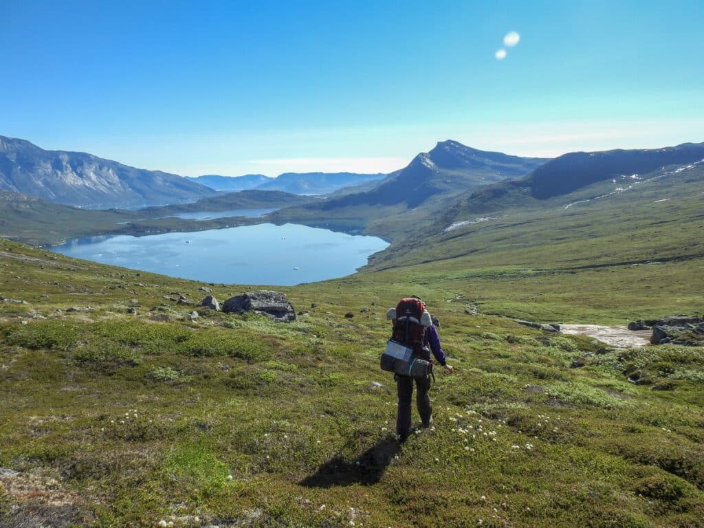 Woman hiking from Kapisillit to Qooqqut
