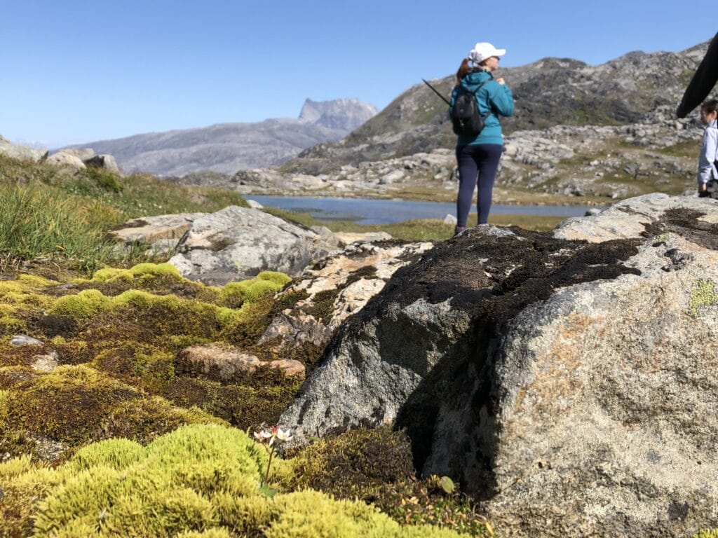 Woman standing on a rock