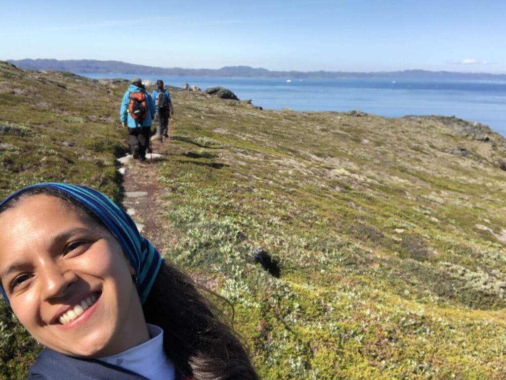Woman taking a selfie during a hike around Lille Malene