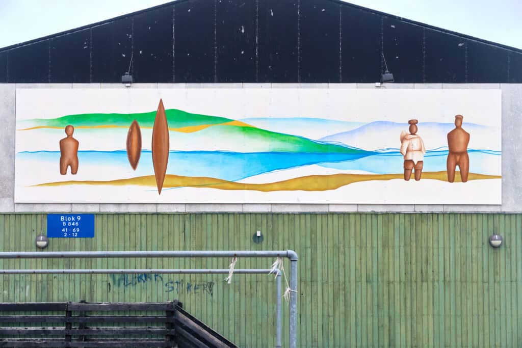 One of several murals on the ends of Aasiaat's apartment blocks