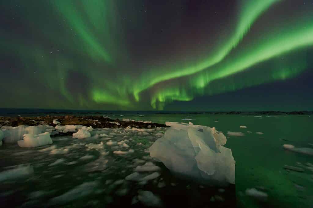 Northern lights over the fjord