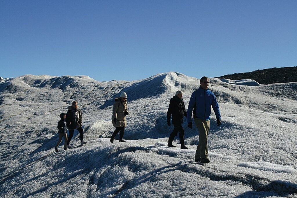 People walking in the snow in Kangerlussuaq