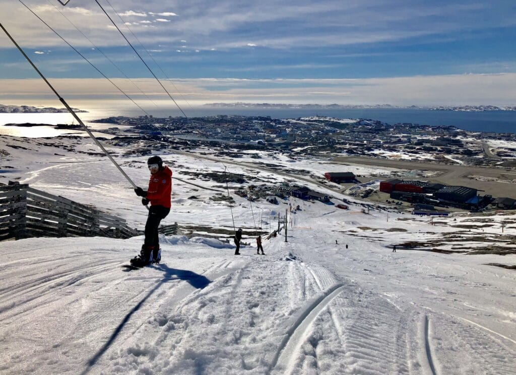Man coming up with the ski lift