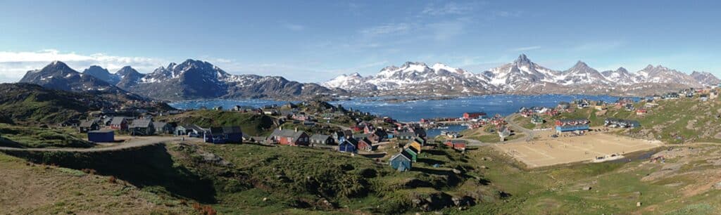 Tasiilaq from the top of a hill during summer time