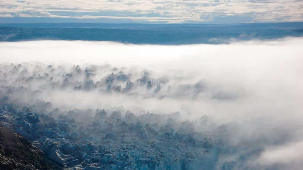 White fog over glacier in Greenland