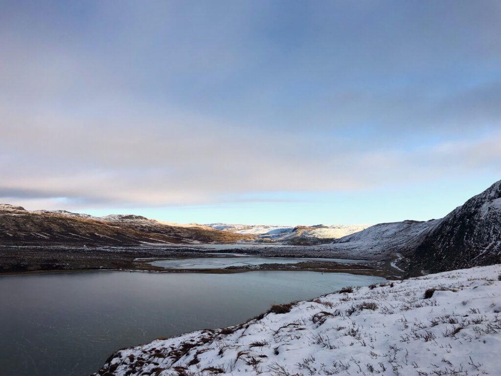 Sun rising above nature in Greenland