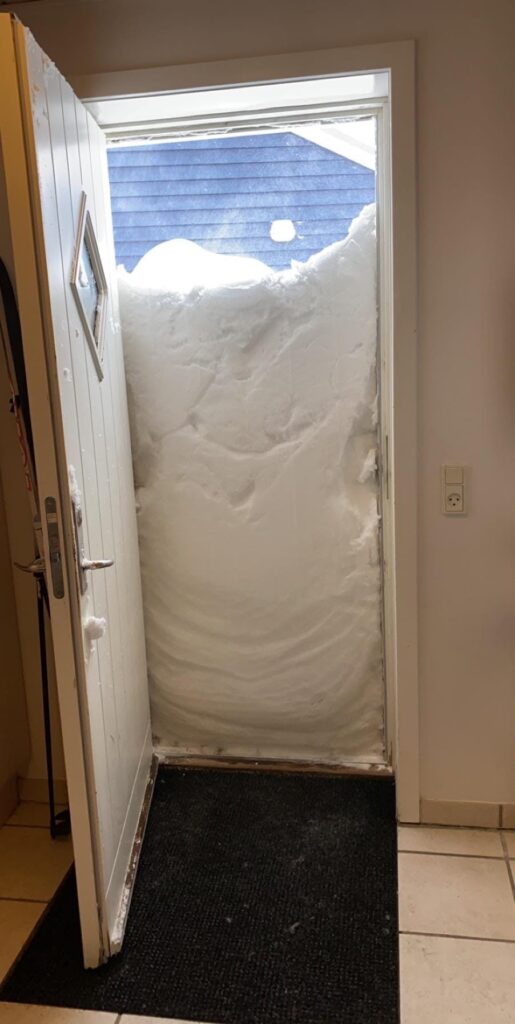 Snow blocking the door