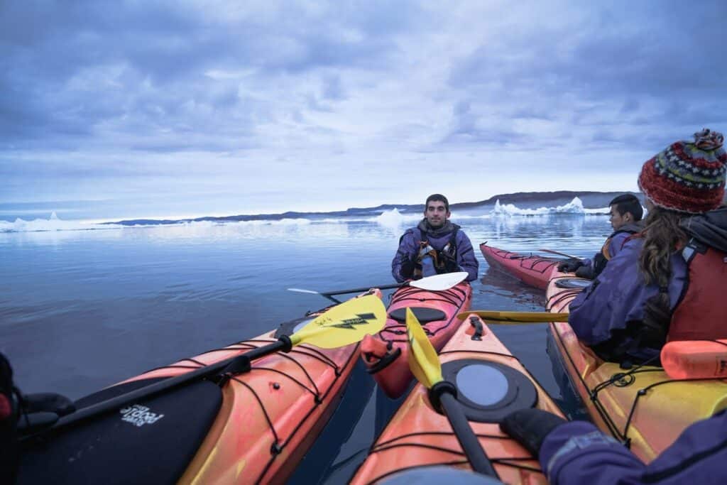 Kayaking among icebergs