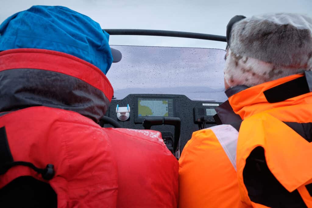 Bundled up in flotation suits on the way to Hvalsey Church - Qaqortoq