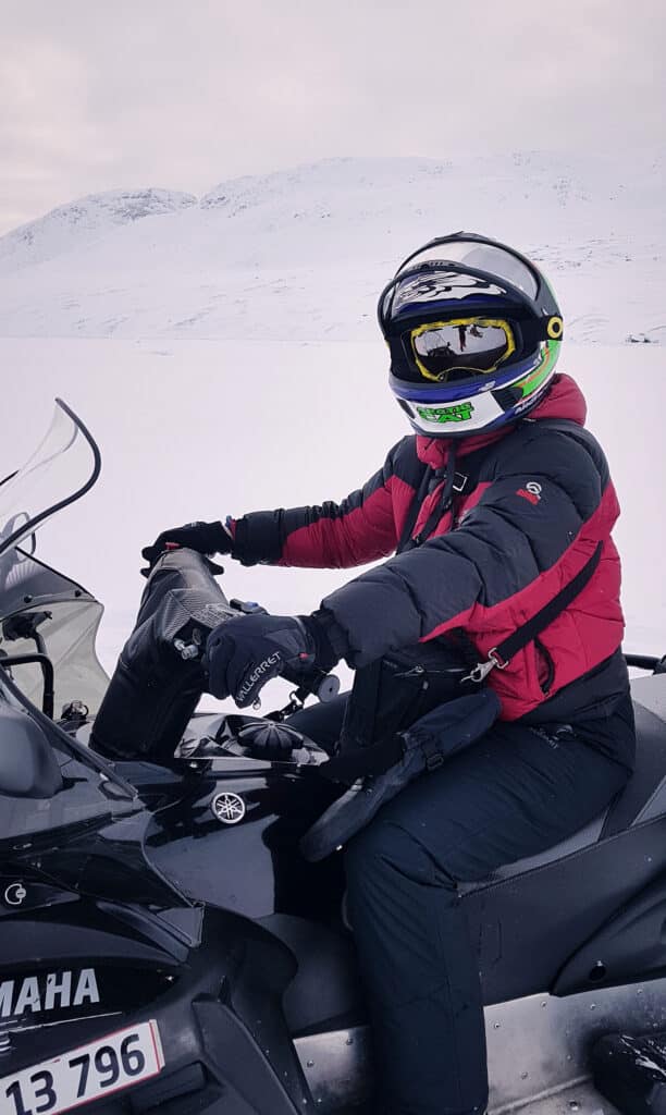 Snowmobile rider rugged up near Sisimiut