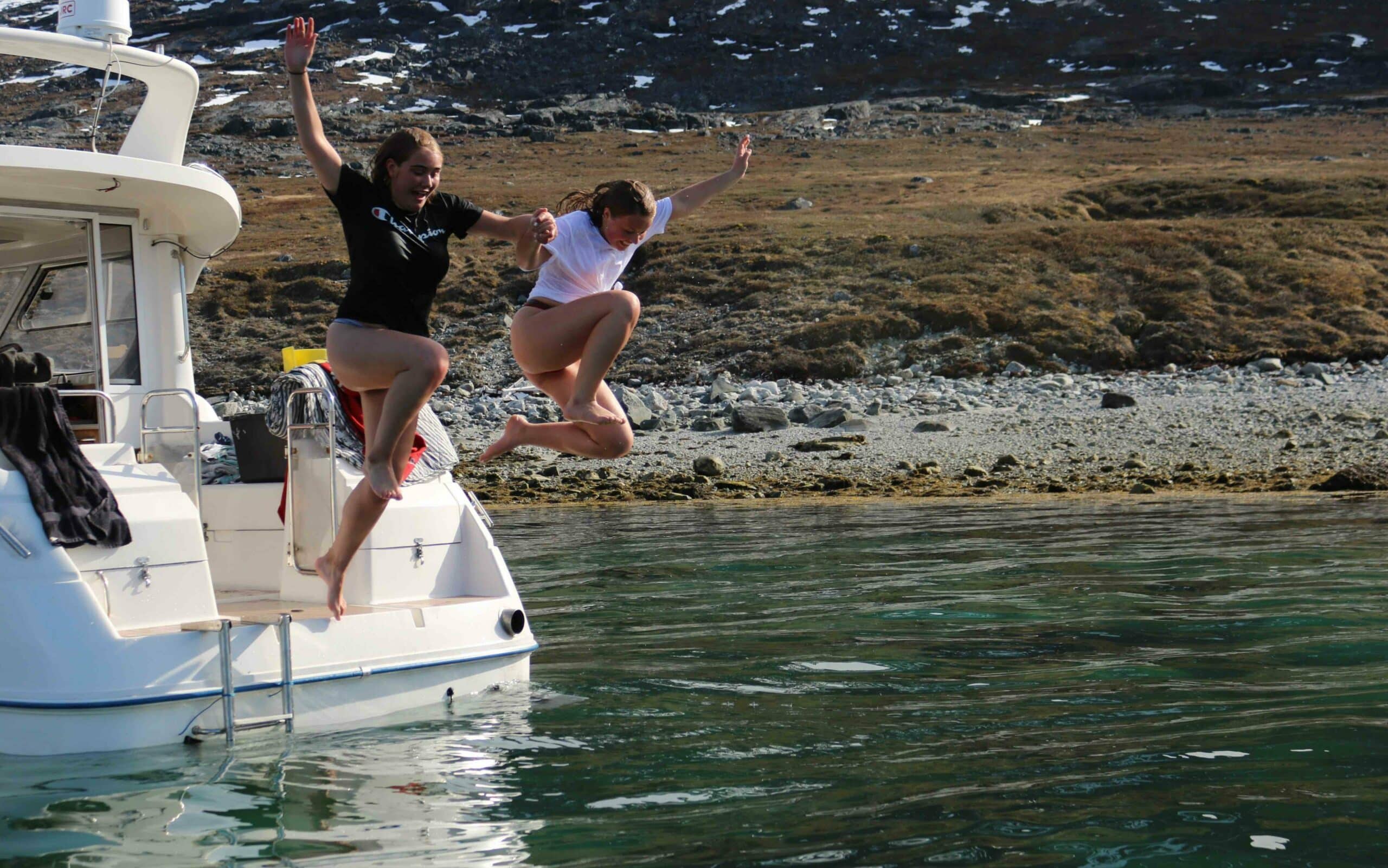 Jumping in from the boat in summer.