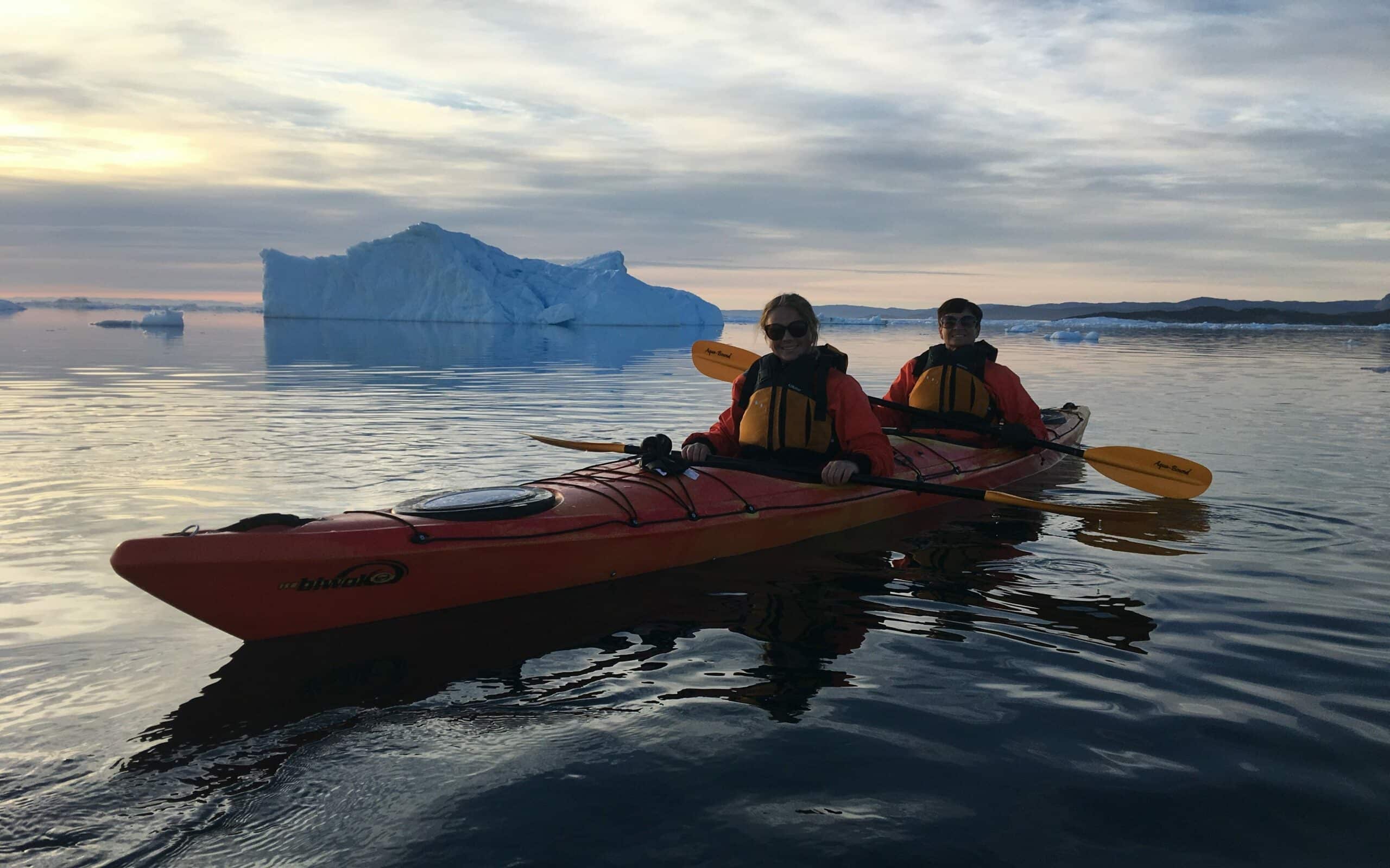 Kayaking in Ilulissat icefjord.